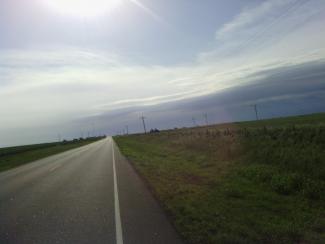 The state road cut through a large wind farm.
