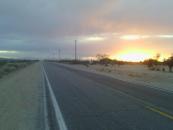 Sun setting over the desert as I rode to my campsite