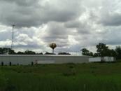 This water tower looked like a hot air balloon from behind the trees. The sky looks cool too.