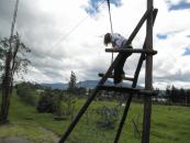 Sarah playing on the zip line at Cafe de Vaca.  Zip lines are pretty common on playgrounds.
